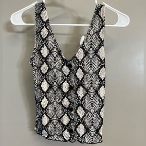 CAUTION TO THE WIND TANK